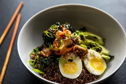Quinoa and Rice Bowl With Kale Kimchi and Egg