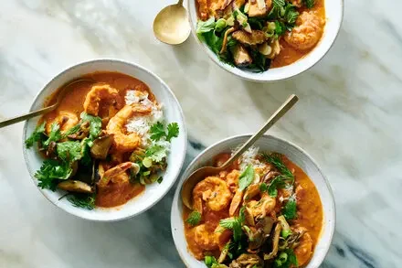 Spicy Tomato Coconut Bisque With Shrimp and Mushrooms
